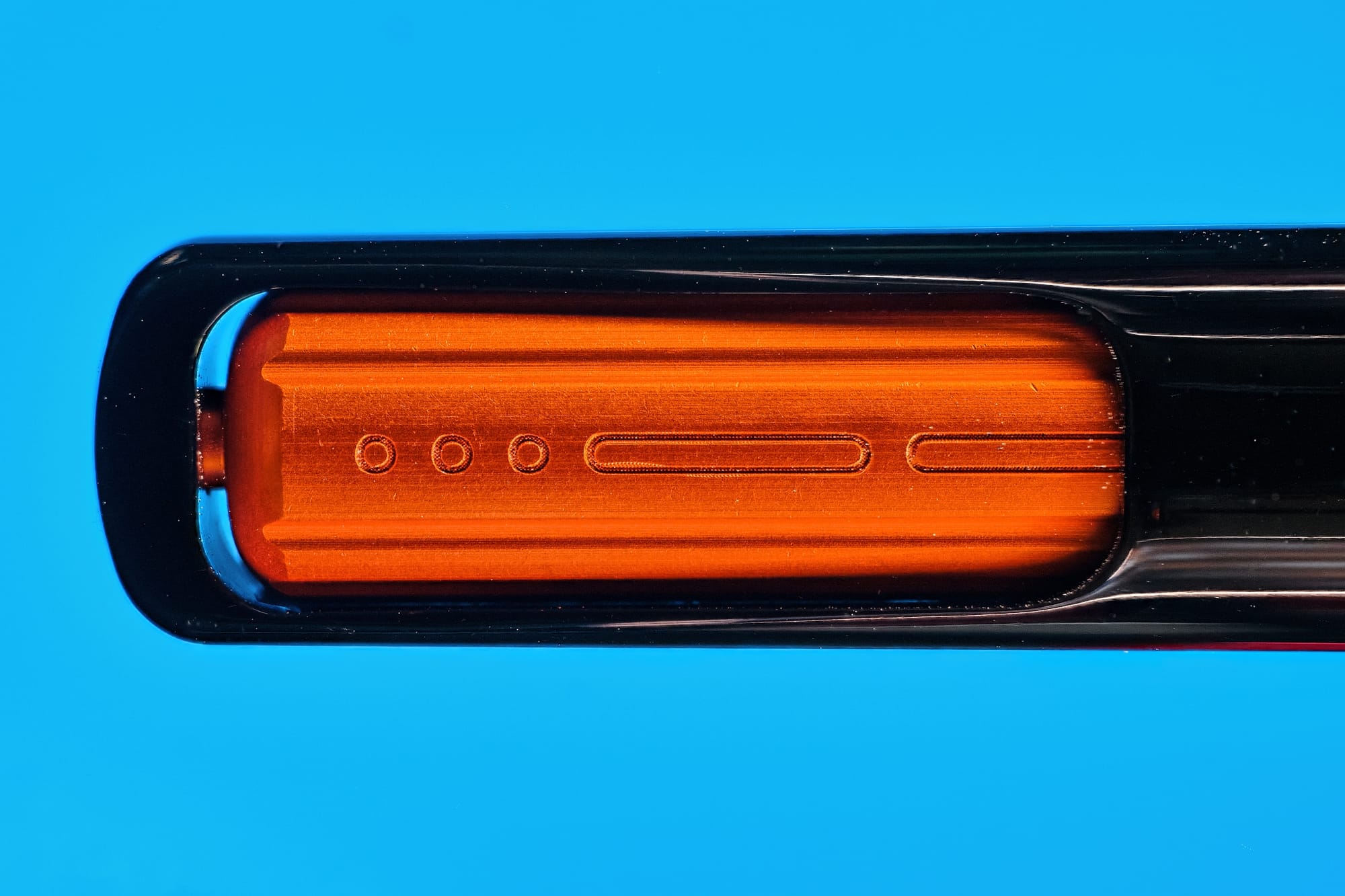 Close up of the Endless Captiva's orange piston knob