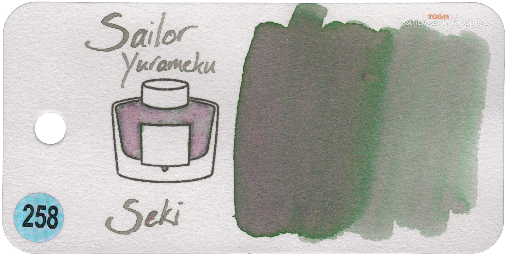 An ink swatch of Sailor Yurameku Seki, a grey chromashading ink with pink & green tones showing through.